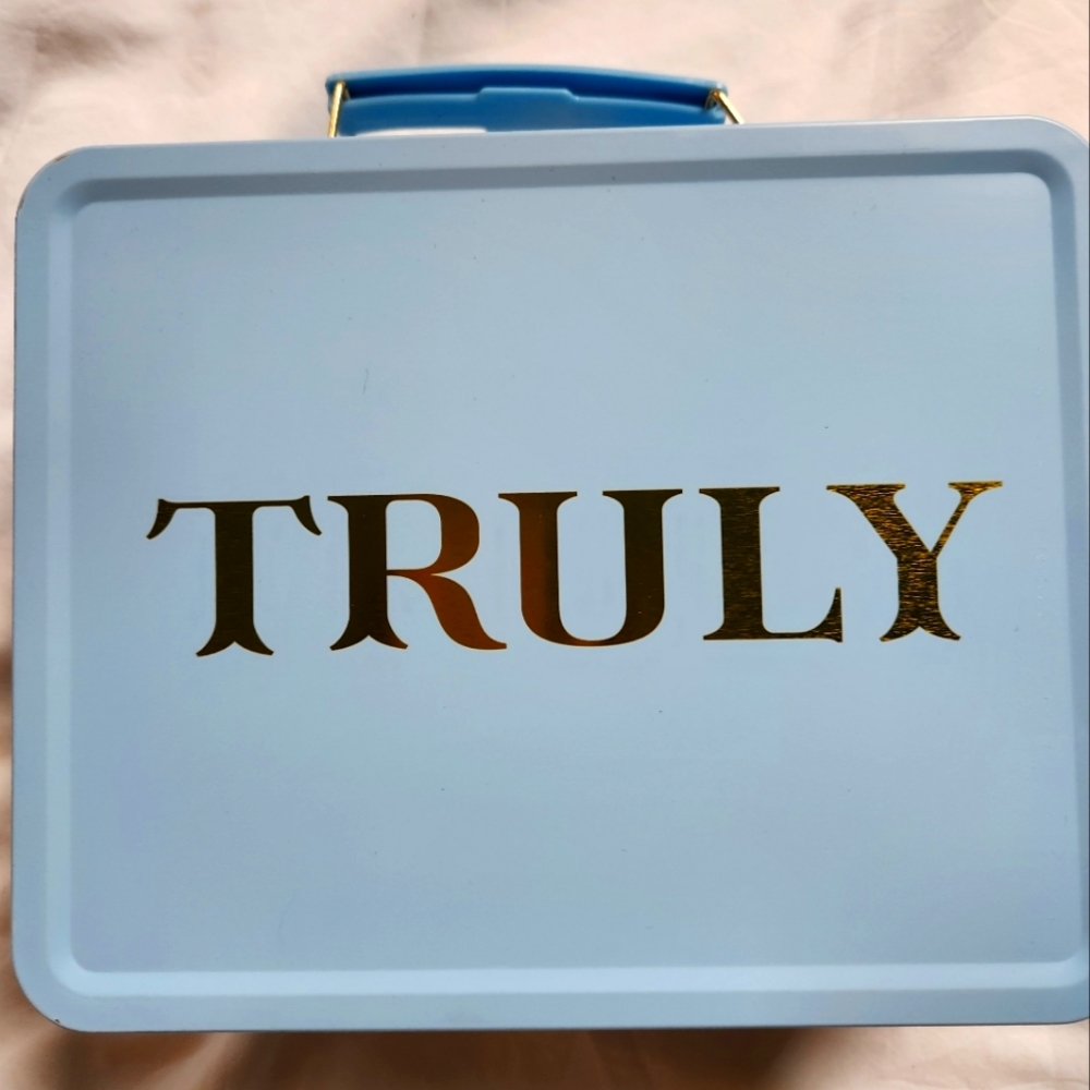 Light blue, lunchbox, carrying case by Truly.